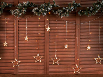 Red Brown Wood Wall Decored By Star Chandelier And Christmas Garland Crestwood Spruce Backdrops IBD-24247